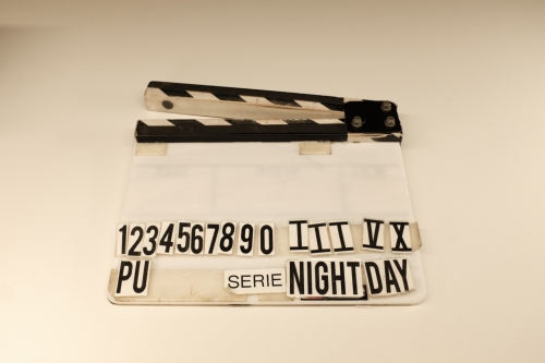 Rainy weather slate with white velcro and white velcro marks. 